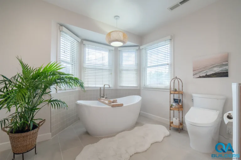 Remodeled bathroom with freestanding tub in a bay window in Campbell