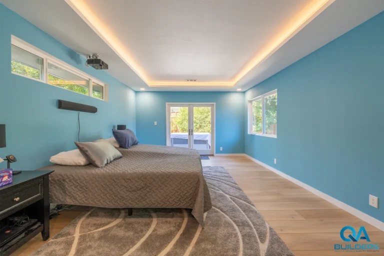 Bedroom in the addition with a lit tray ceiling, clerestory windows and French doors, Santa Clara
