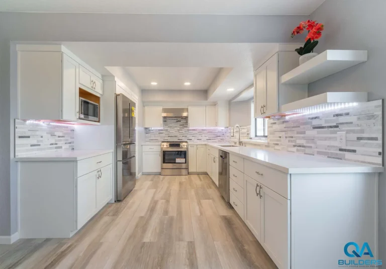 Remodeled Redwood City kitchen with white shaker cabinets and quartz counters