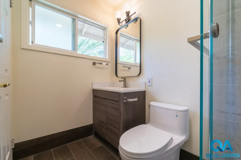 Remodeled Santa Clara bathroom with gray vanity and black matte mirror
