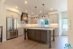 Remodeled Livermore kitchen with gray-stained island and pendant lights