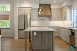 Kitchen island and copper range hood after a Livermore kitchen remodel