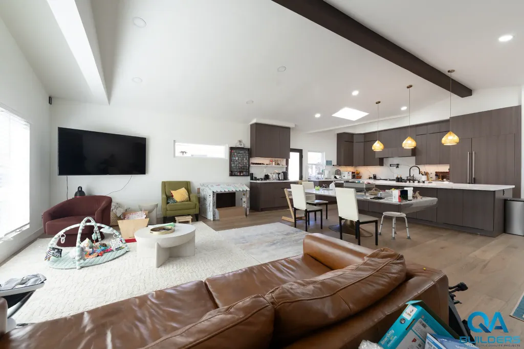 Vaulted great room with the kitchen beyond in a San Jose home addition