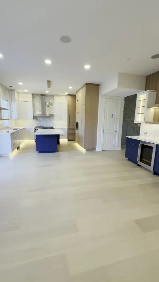 Built-ins, fireplace wall and open kitchen in San Jose