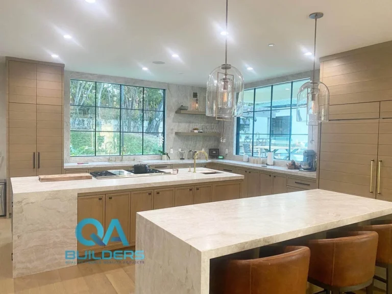 Kitchen remodel with custom oak cabinets and waterfall stone island