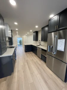 Galley kitchen remodel with a peninsula and recessed lighting in San Jose